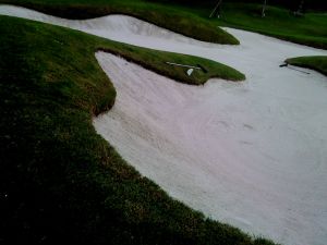 Now almost all new bunkers in Malaysia 'must' look like this. I once asked "Why?!" and was told "There's a new cloth/coat/technology to hold the sand". "Thats good" I said "but it will still increase your construction and maintenance cost and it looks out of character from your older bunkers!" "Ya... but everyone else has them" was the reply. 